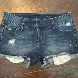 Black Orchid splatter paint denim shorts